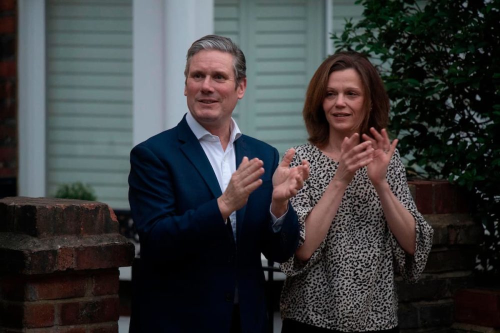 Victoria Starmer and Keir Starmer clapping